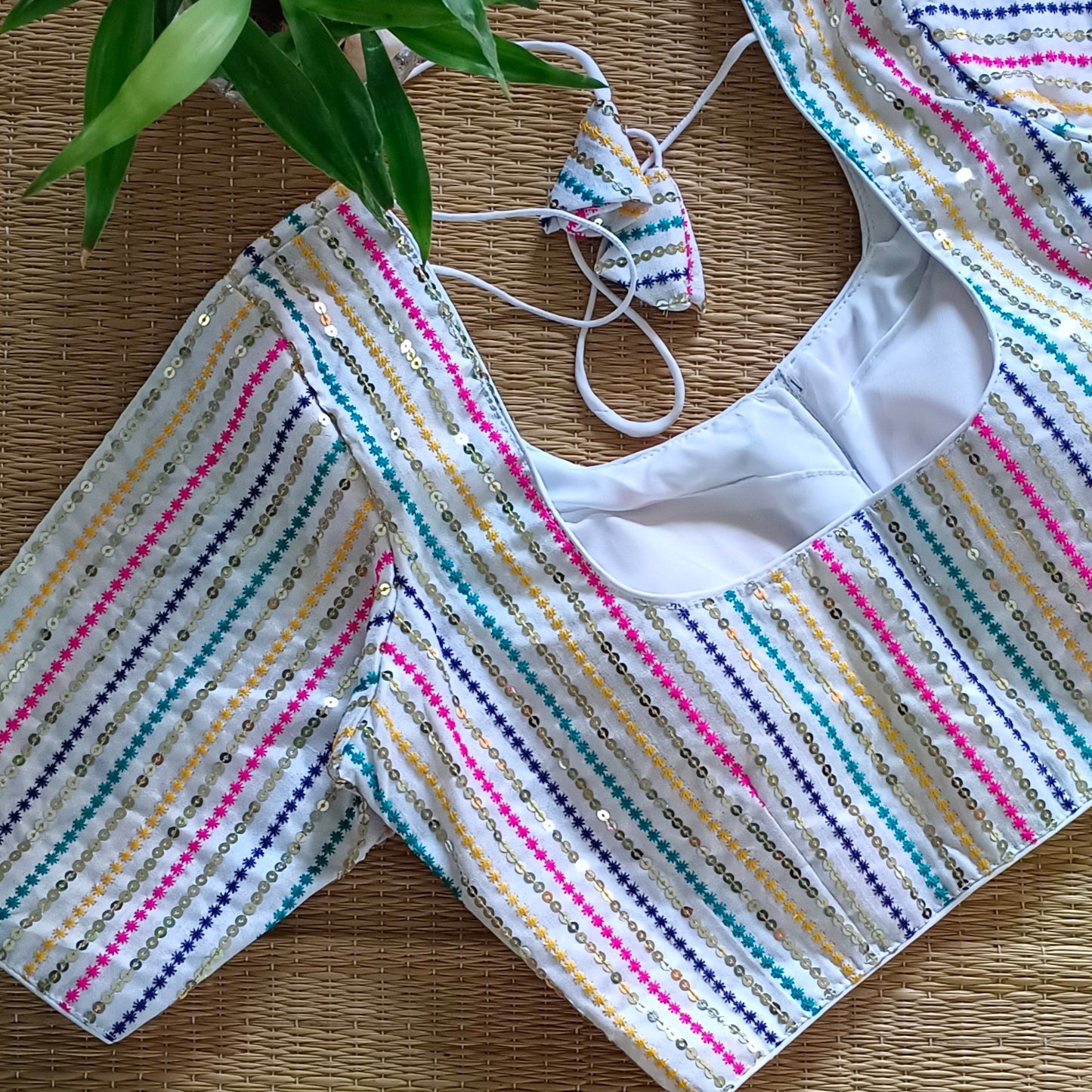 White multi color embroidery with sequence