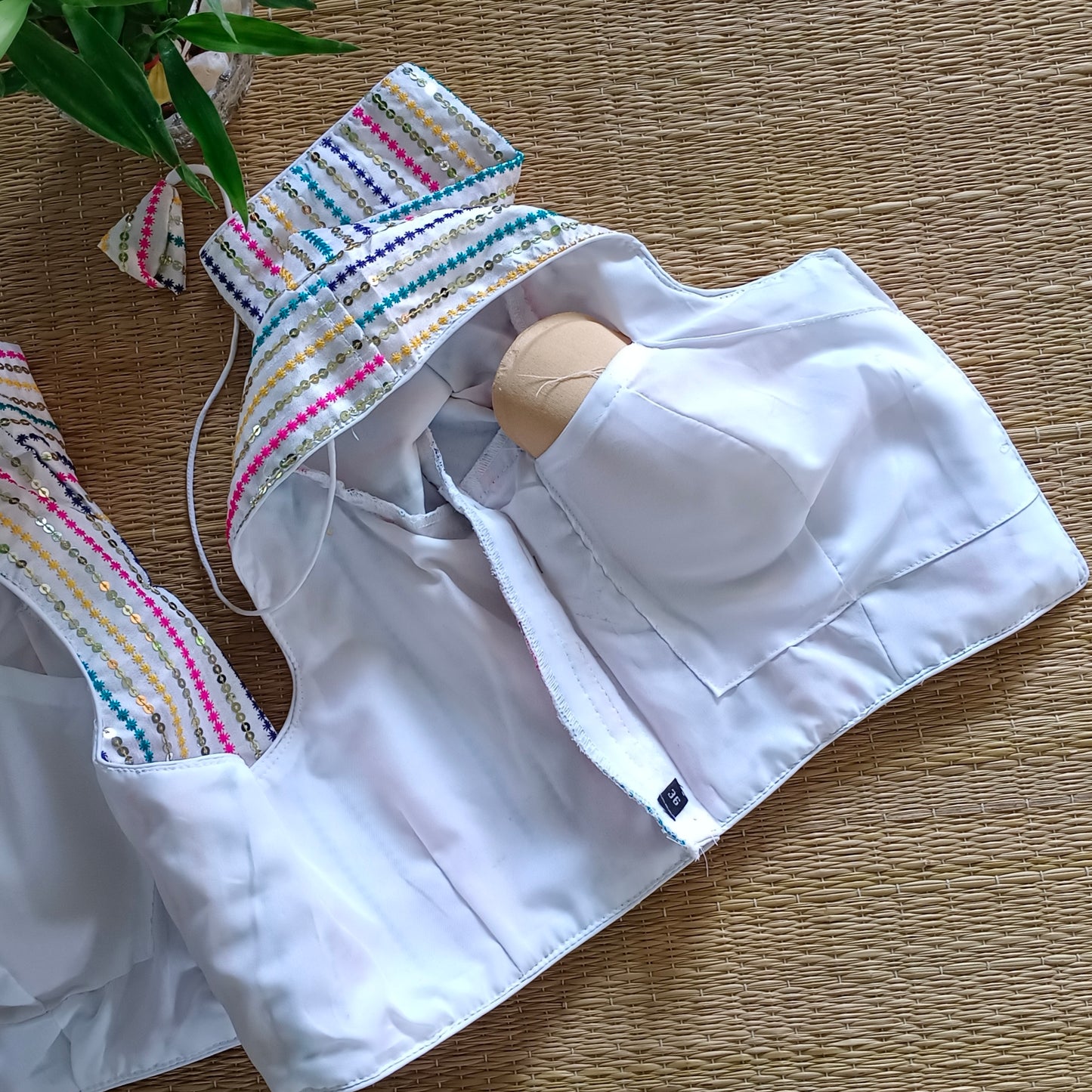 White multi color embroidery with sequence