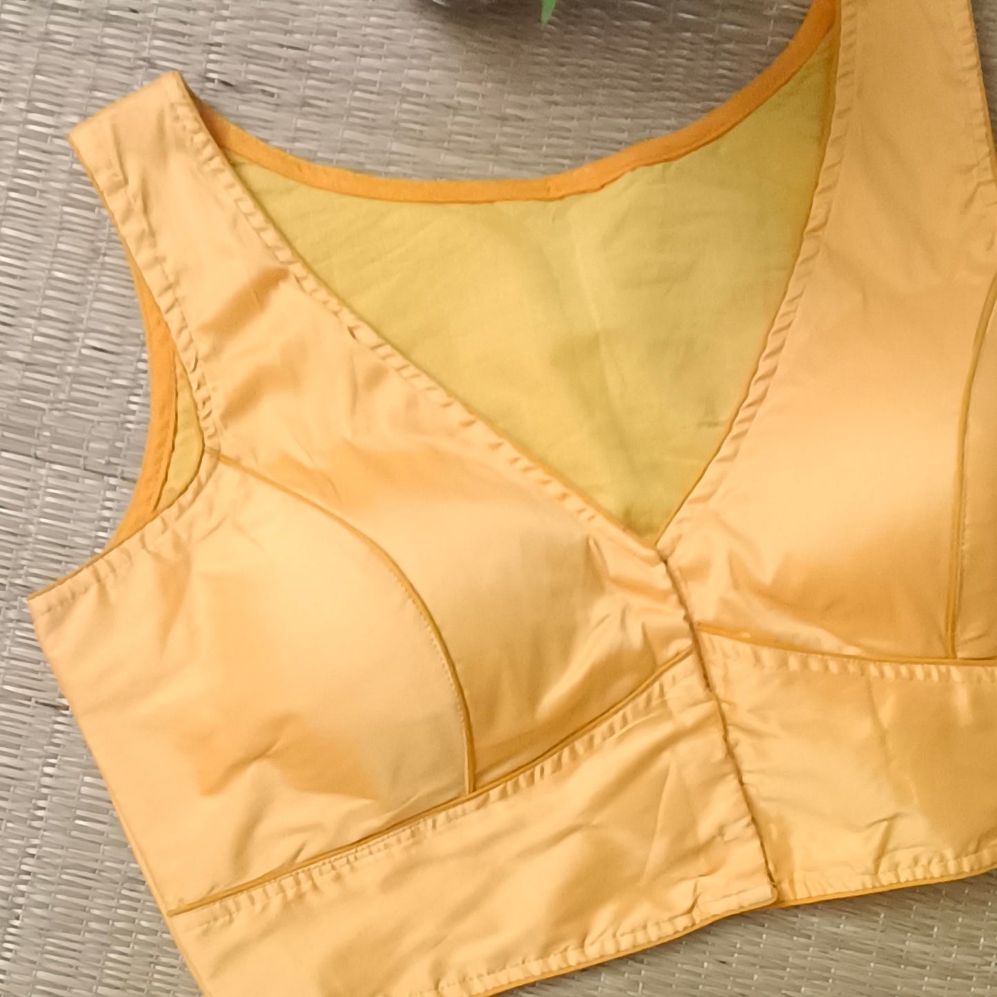 Yellow plain front V-neck sleeveless blouse