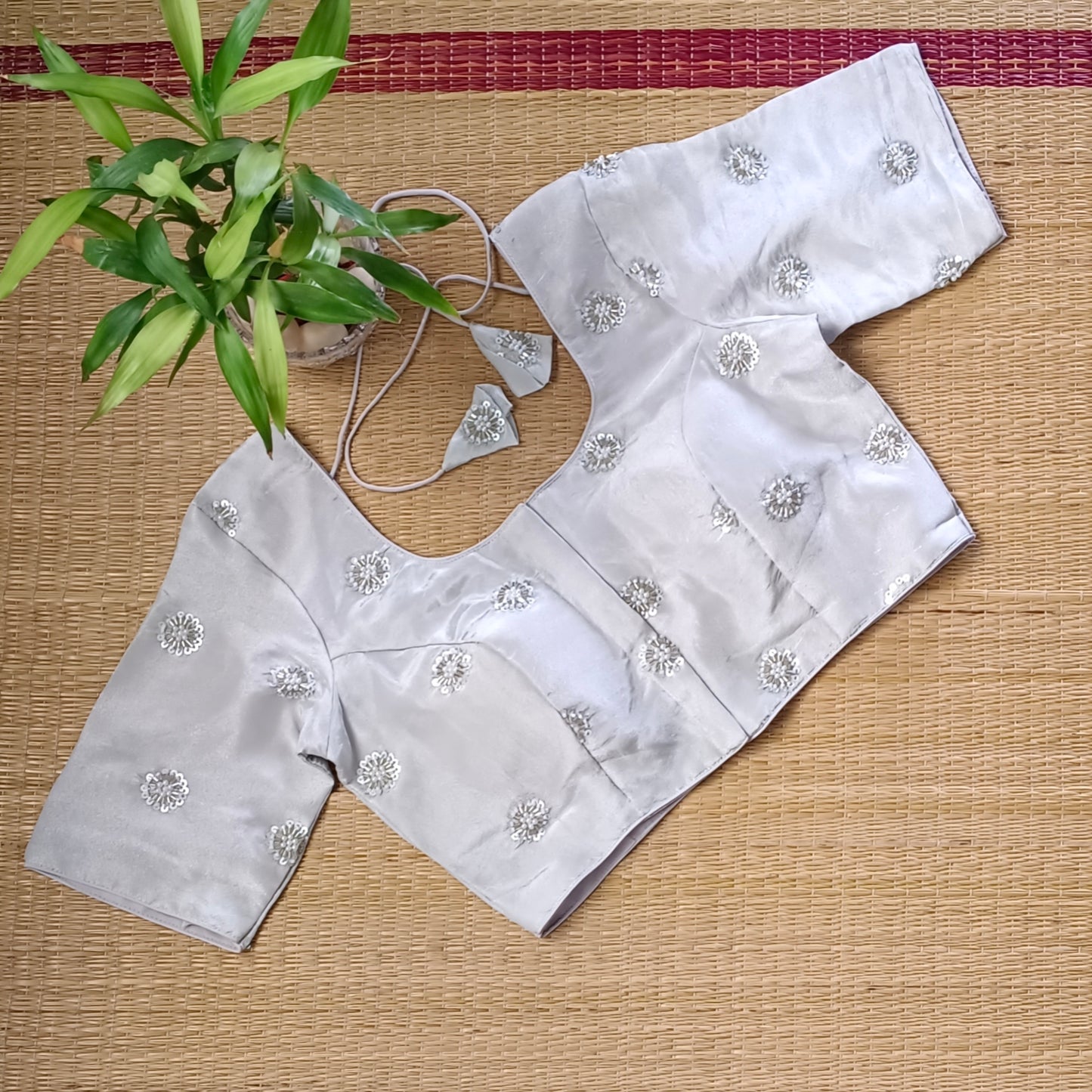 Silver tissue blouse with pearl and cut dhana work(assorted)