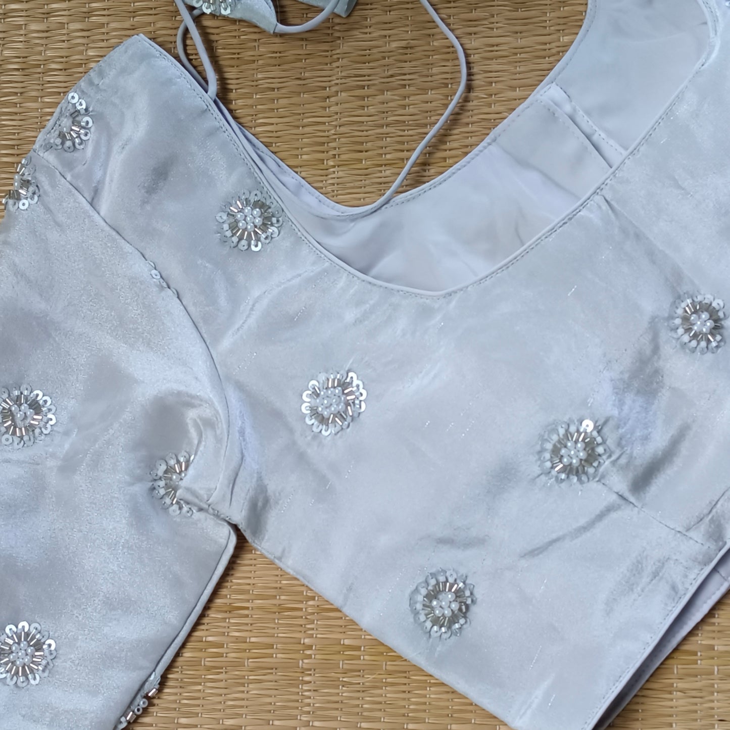 Silver tissue blouse with pearl and cut dhana work(assorted)