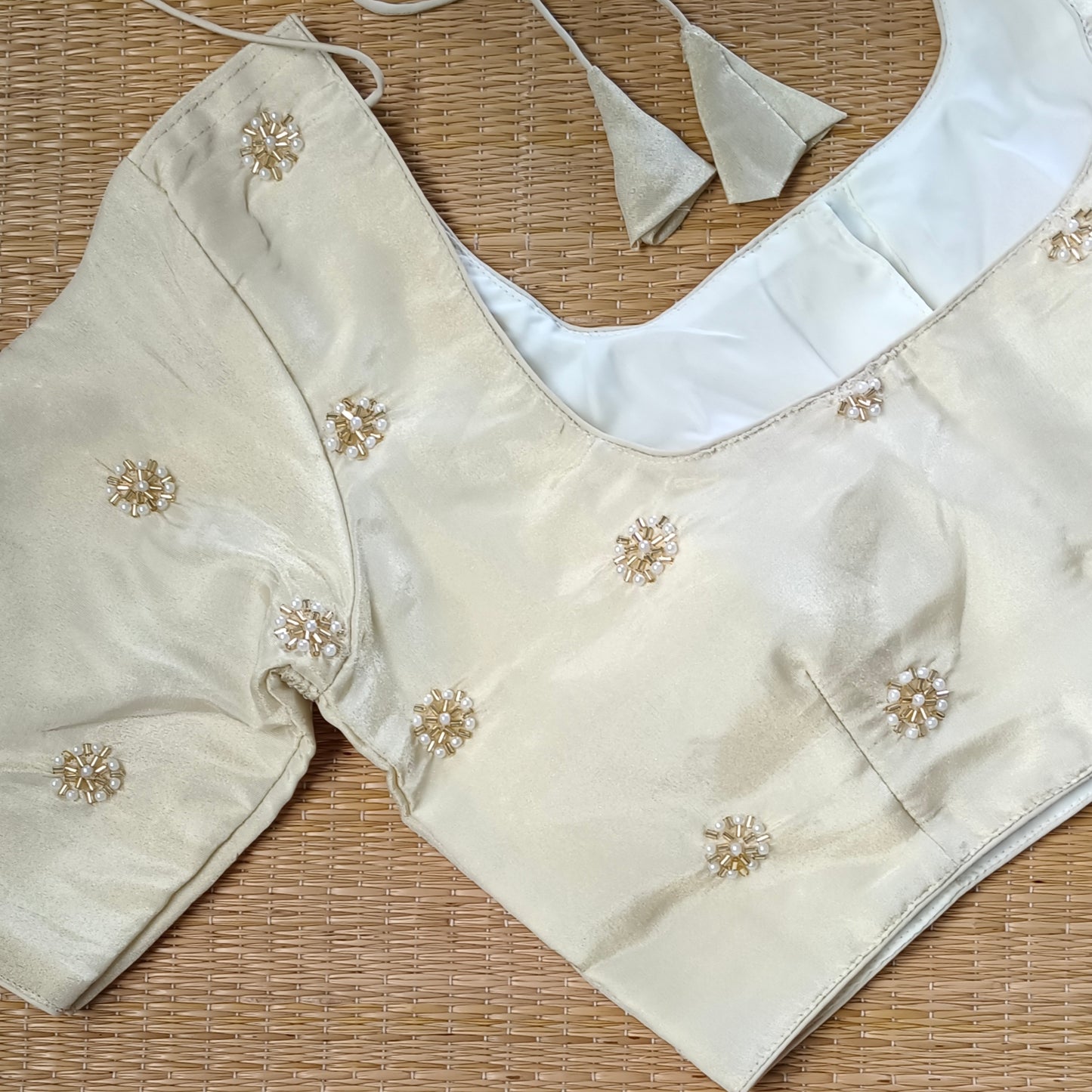 Light Golden Tissue blouse with pearl and cut dhana work( assorted )