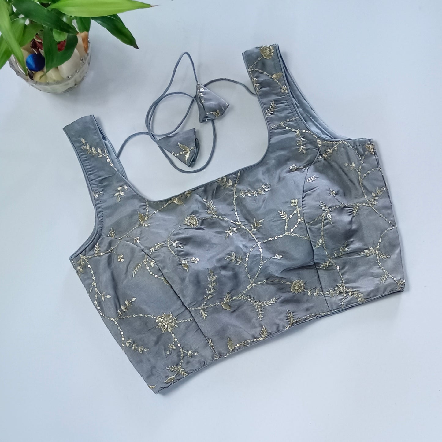 Grey tissue blouse with attachable sleeves
