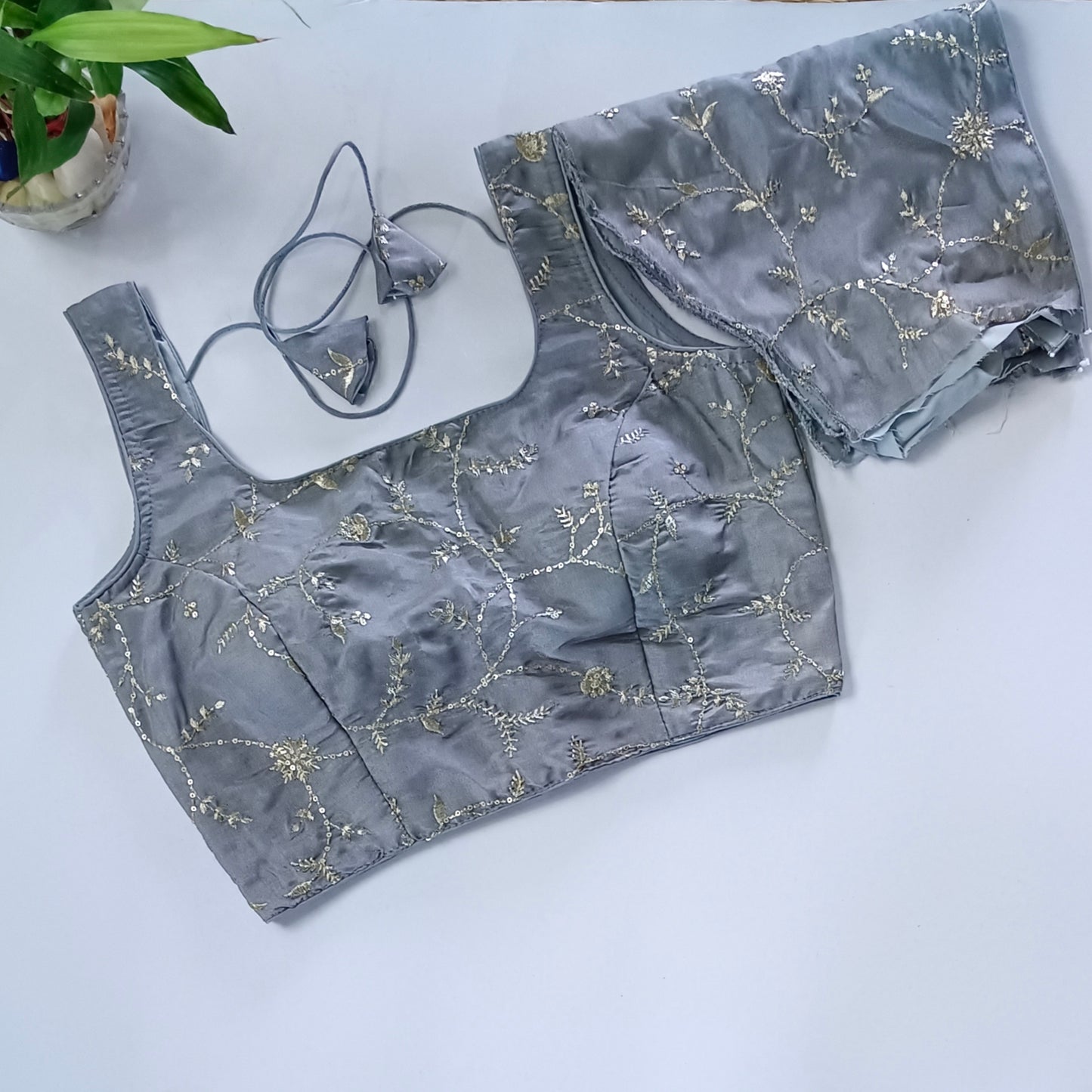Grey tissue blouse with attachable sleeves