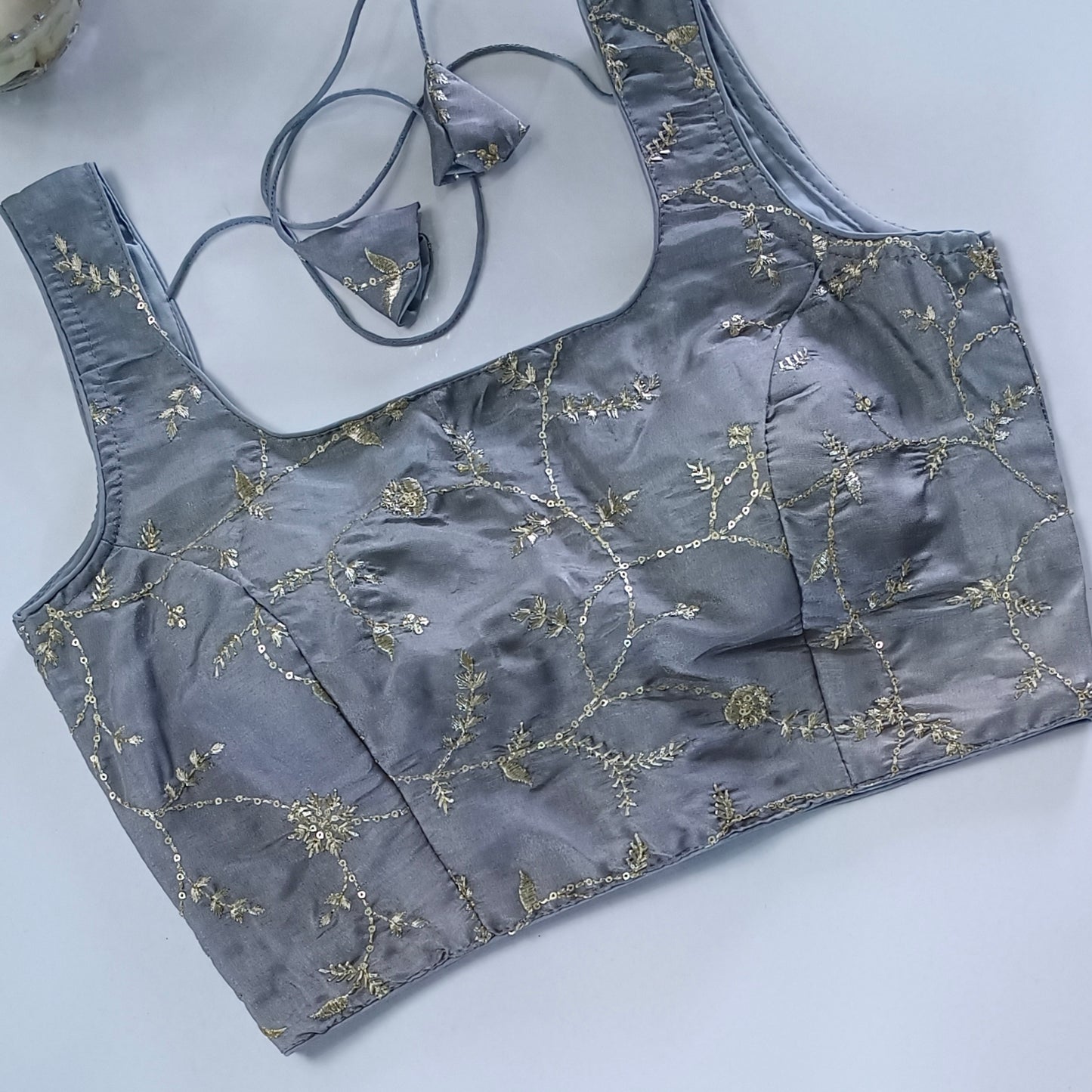 Grey tissue blouse with attachable sleeves