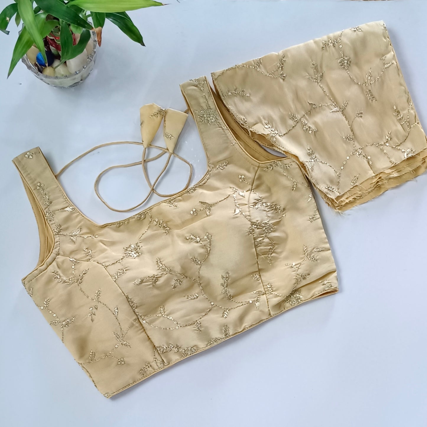 Golden tissue blouse with attachable sleeves