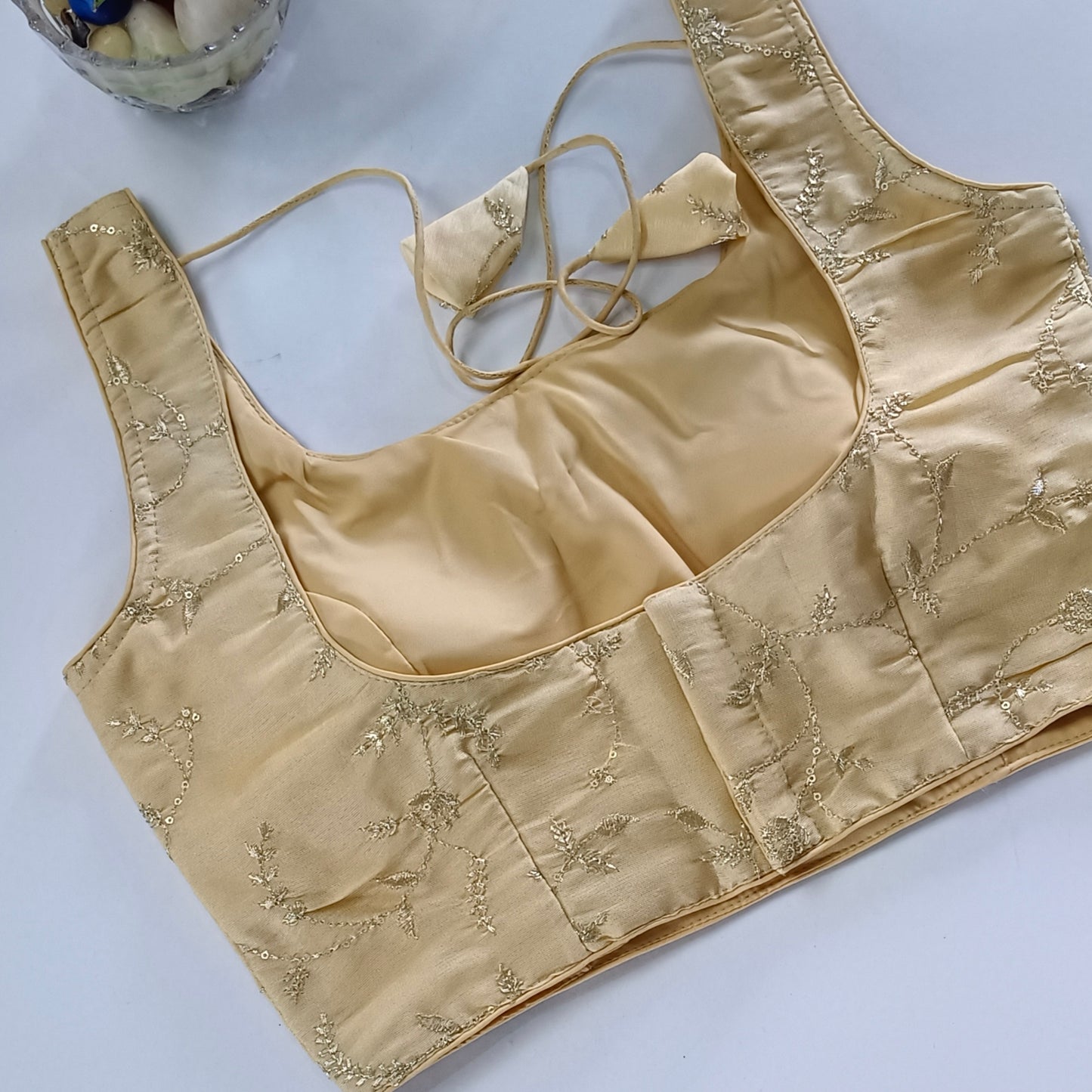Golden tissue blouse with attachable sleeves