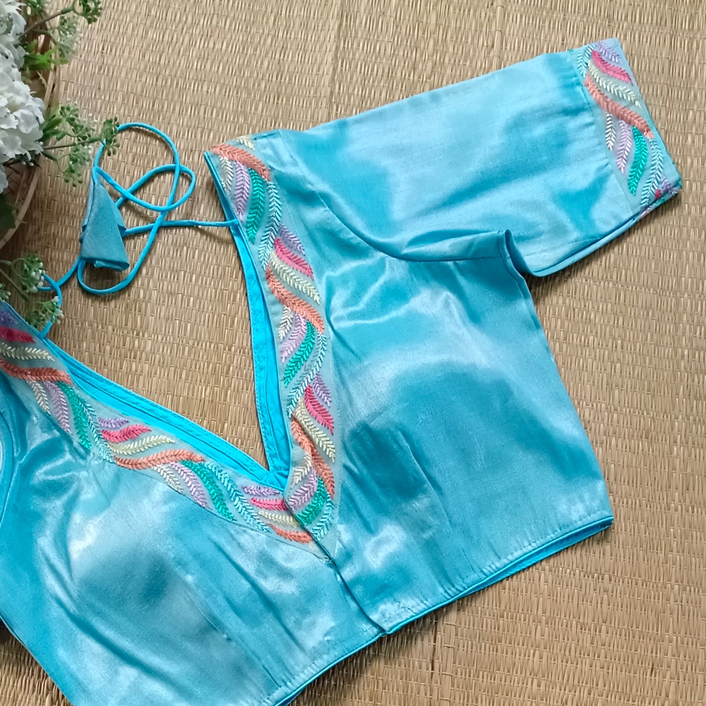 Pastel blue tissue blouse with multicolor embroidery