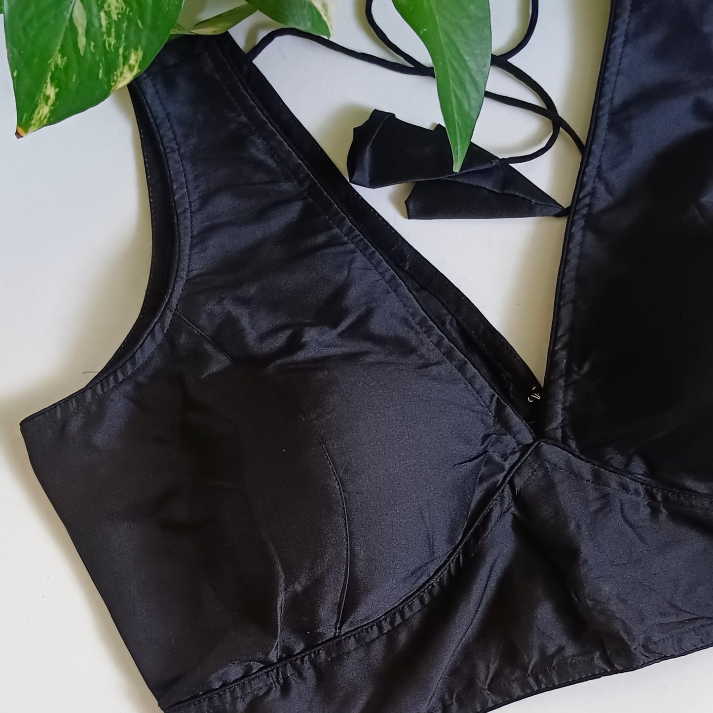 Black plain V-neck sleeveless blouse