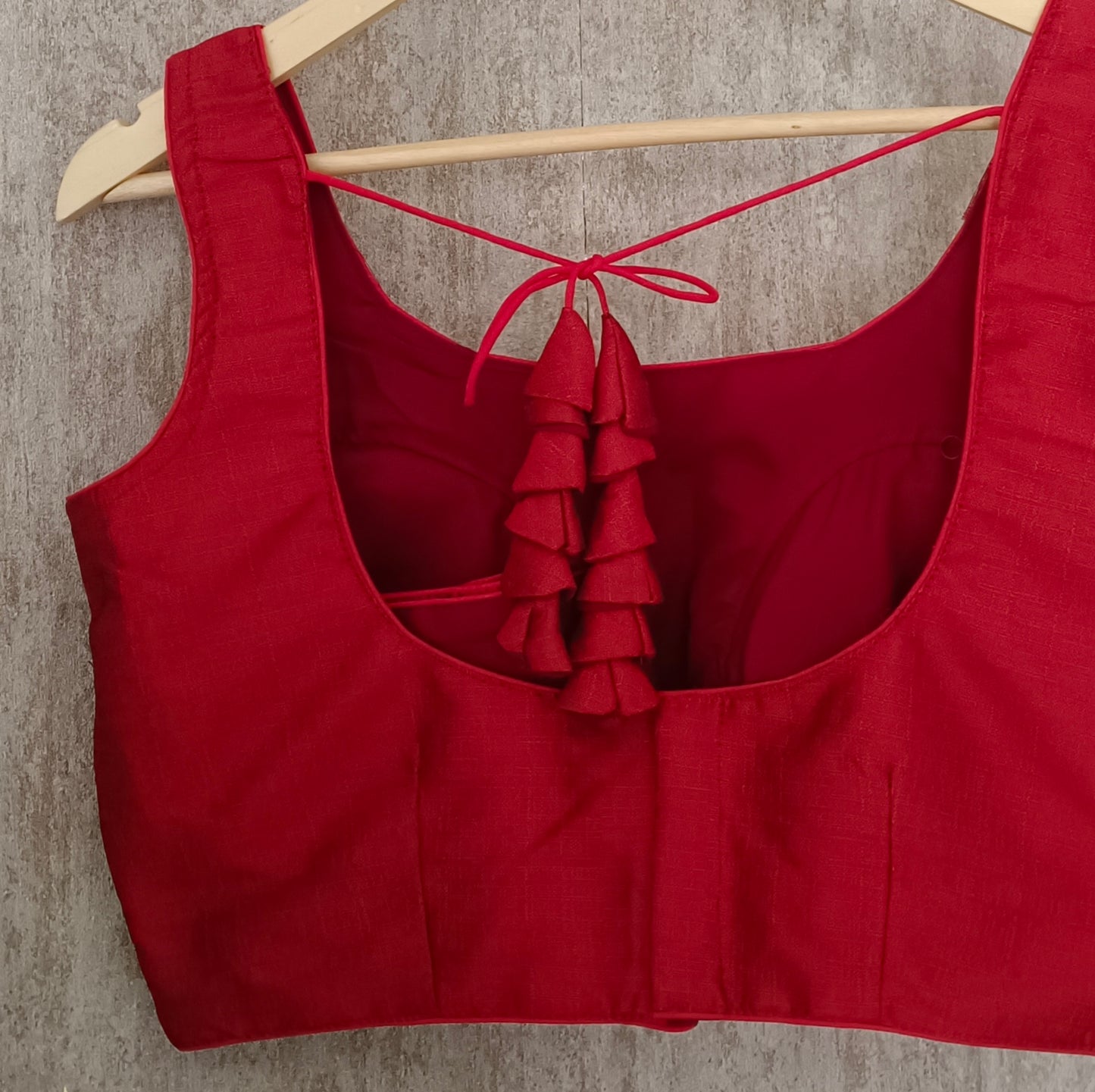Red Sleeveless Blouse