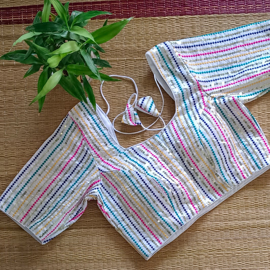 White multi color embroidery with sequence