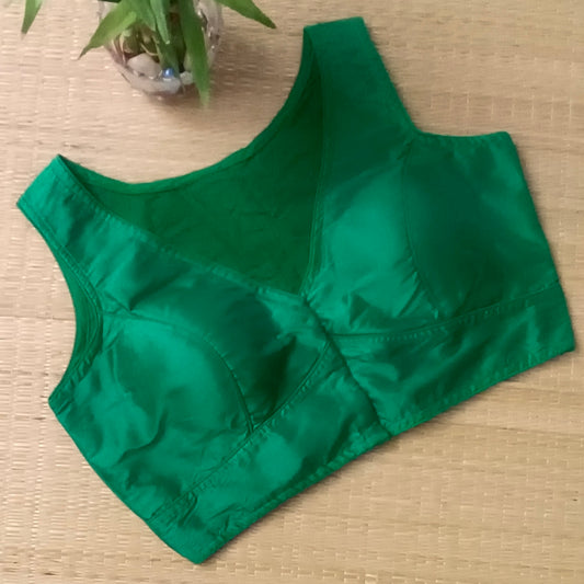 Green plain front V-neck sleeveless blouse