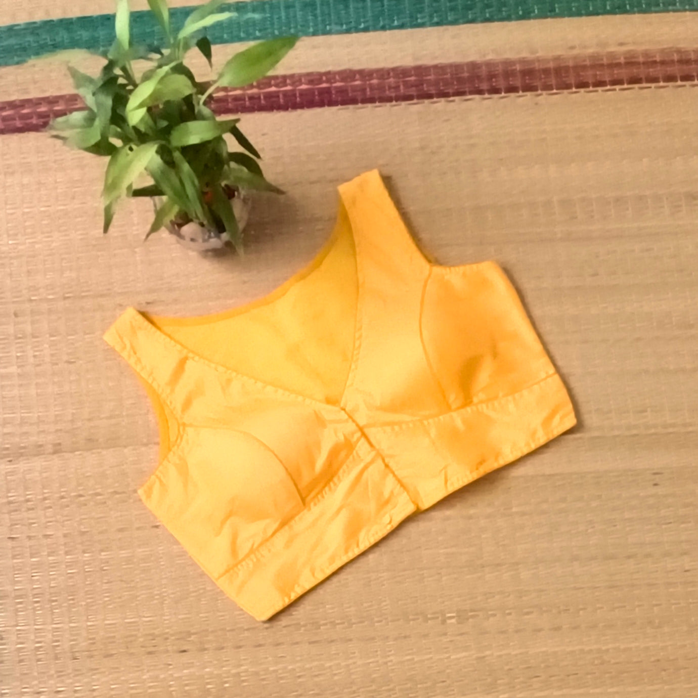 Yellow plain front V-neck sleeveless blouse