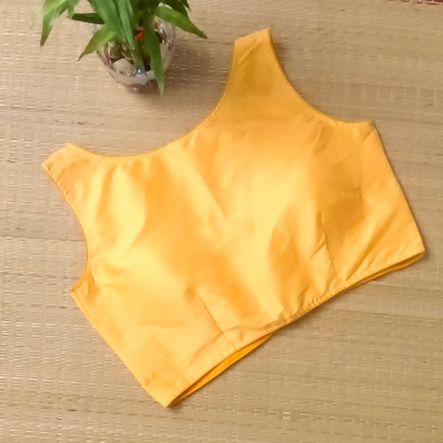 Yellow plain front V-neck sleeveless blouse
