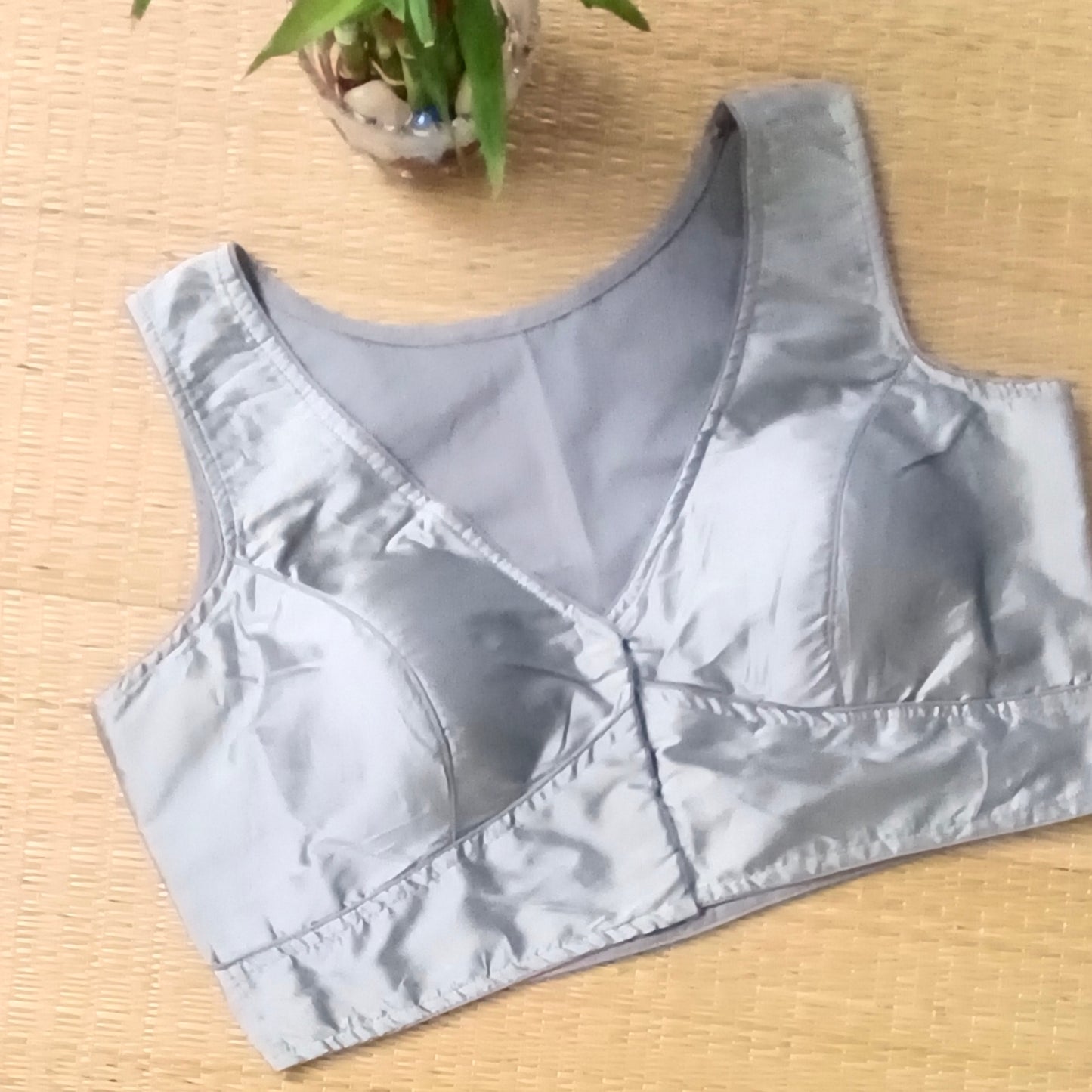 Grey plain front V-neck sleeveless blouse