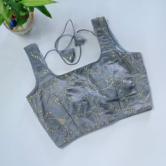 Grey tissue blouse with attachable sleeves