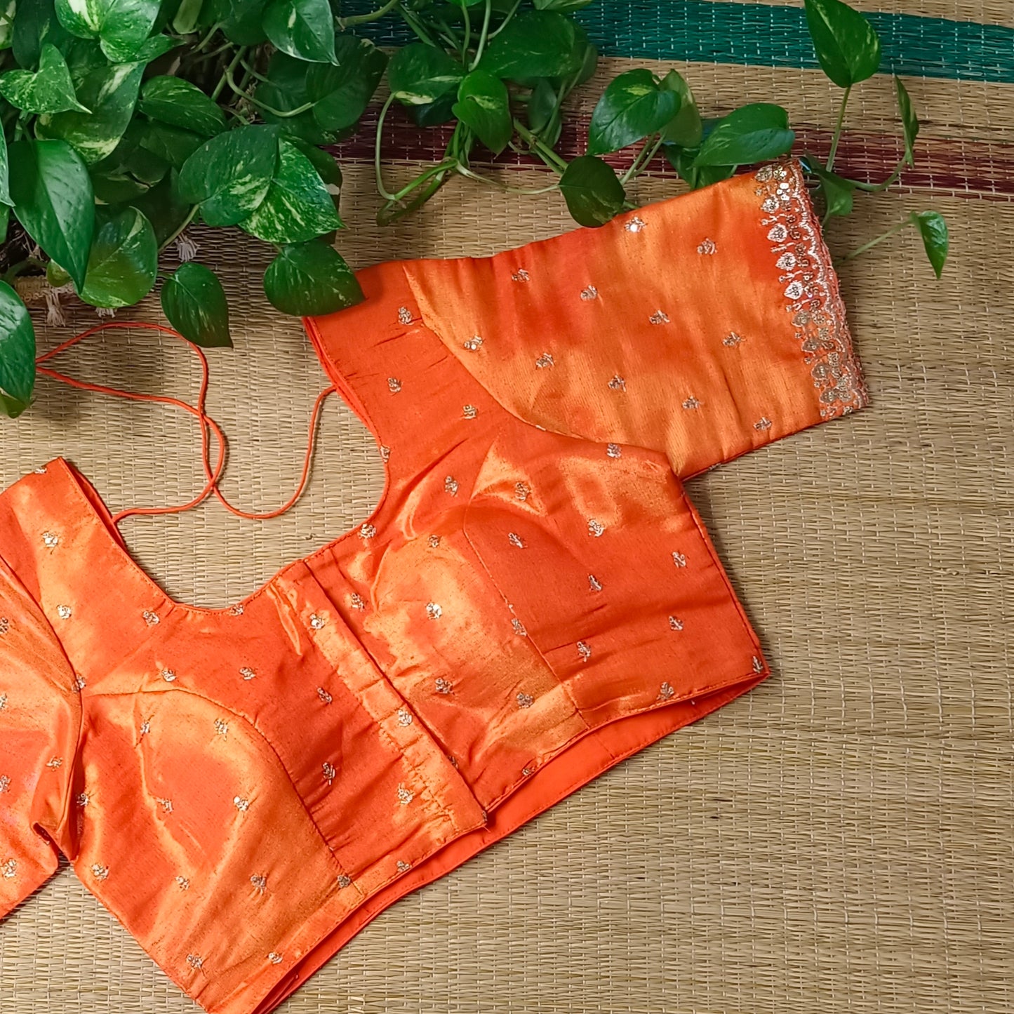 Orange metallic tissue blouse with golden embroidery