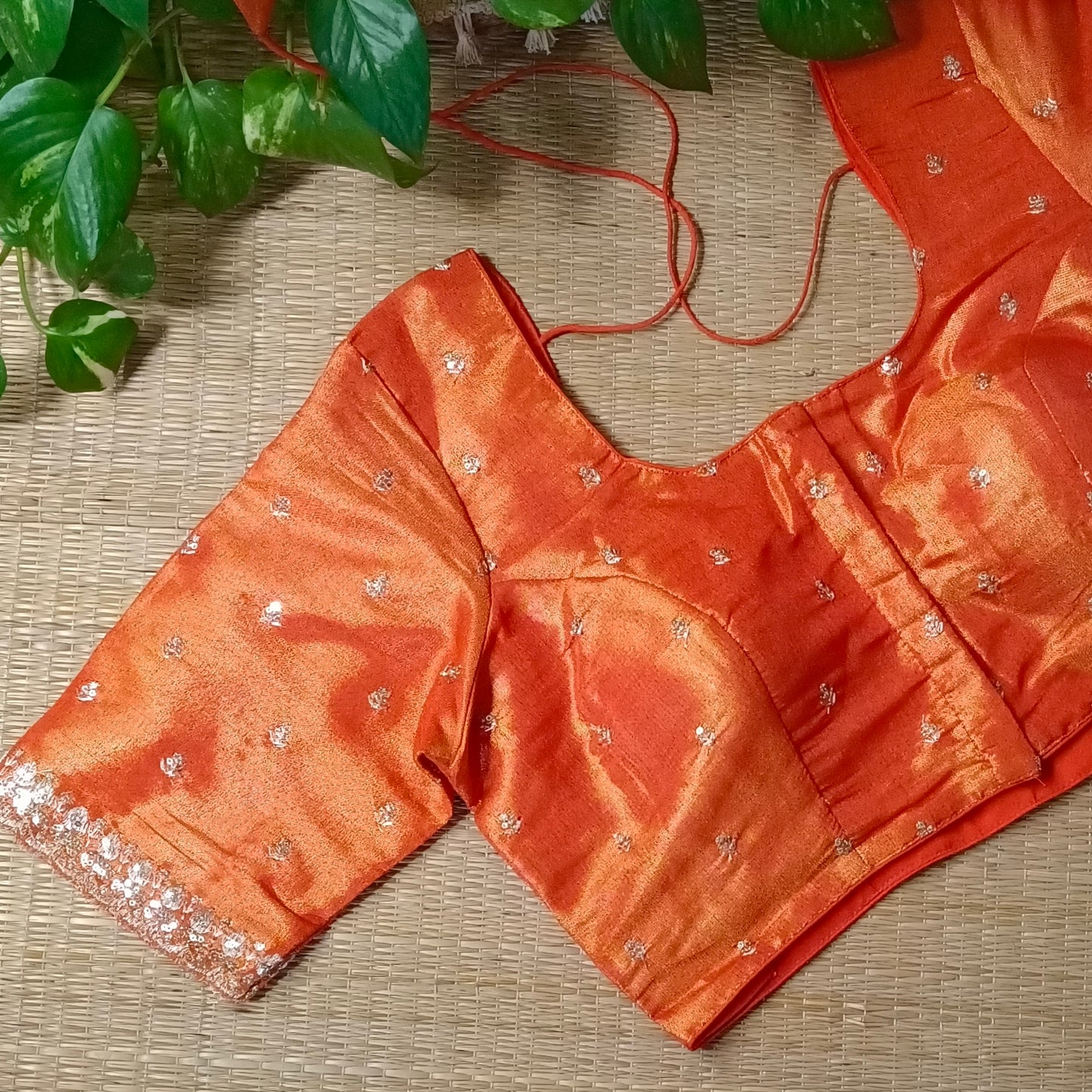Orange metallic tissue blouse with golden embroidery