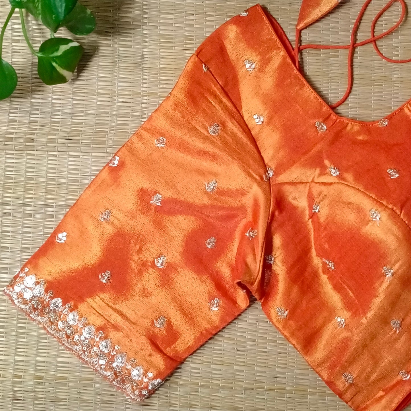 Orange metallic tissue blouse with golden embroidery