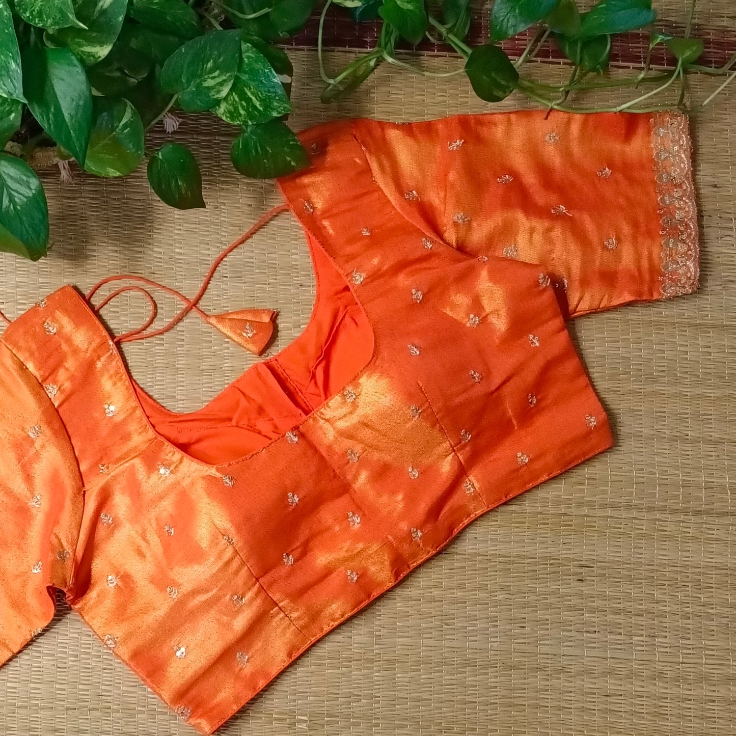 Orange metallic tissue blouse with golden embroidery