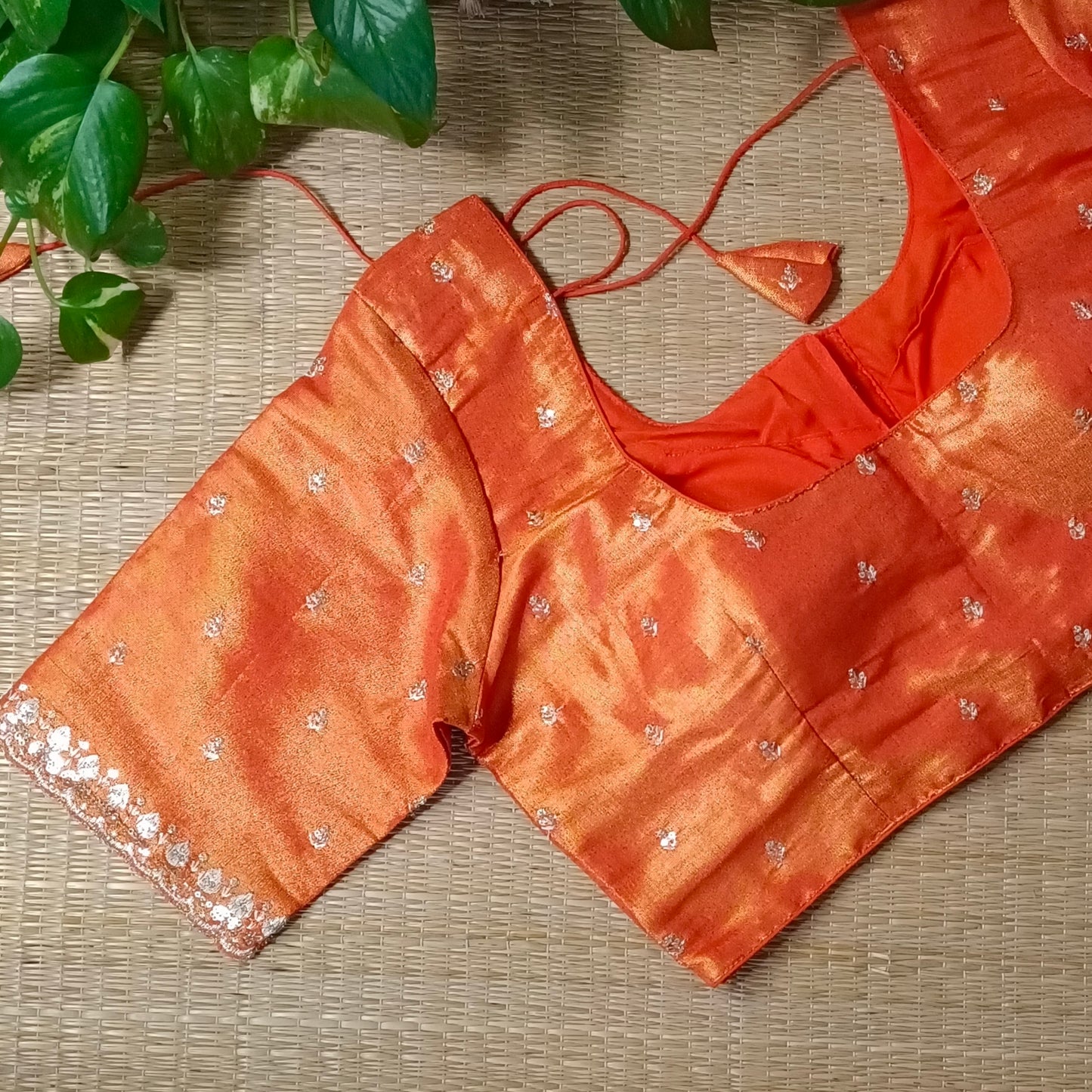 Orange metallic tissue blouse with golden embroidery