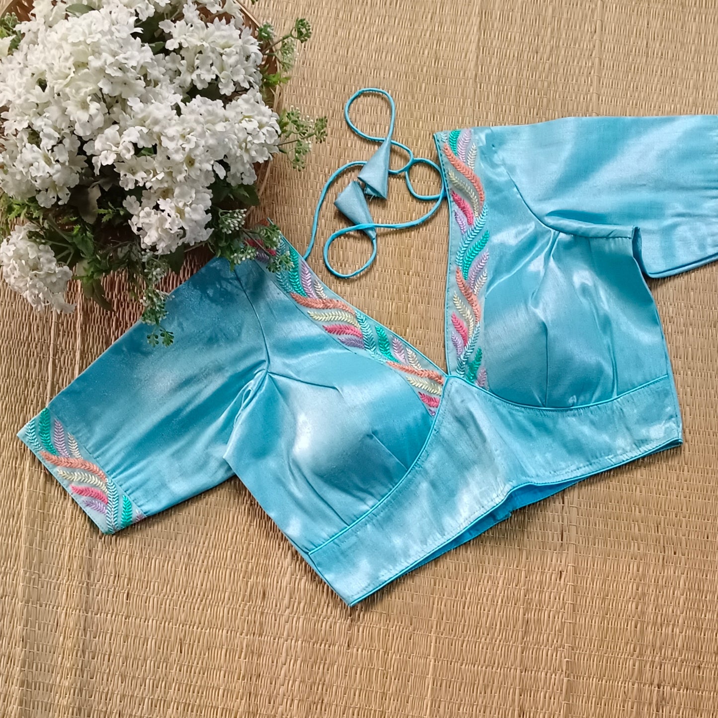 Pastel blue tissue blouse with multicolor embroidery