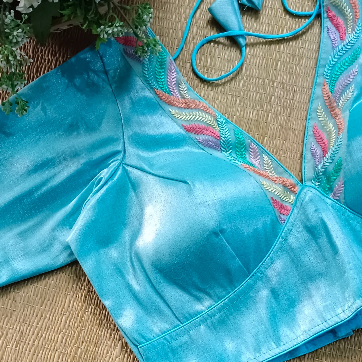 Pastel blue tissue blouse with multicolor embroidery