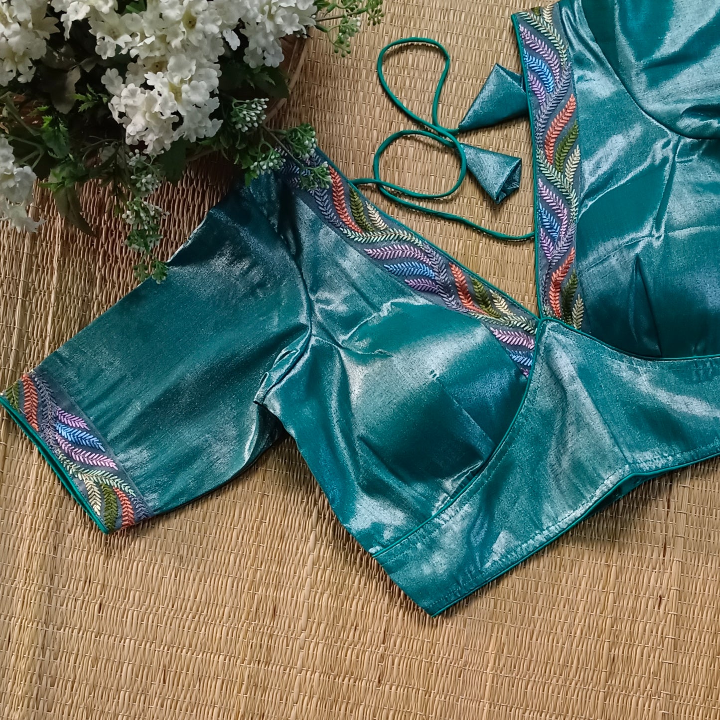 Teal blue tissue blouse with multicolor embroidery