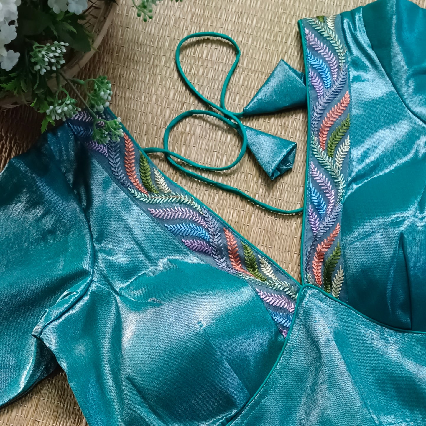 Teal blue tissue blouse with multicolor embroidery