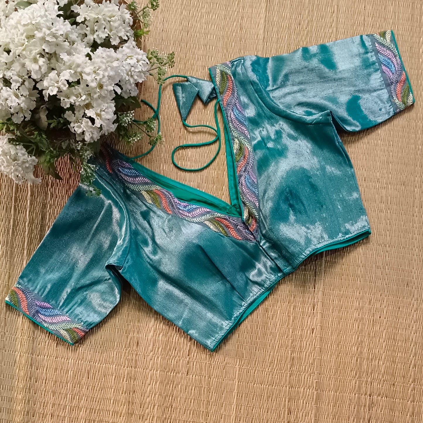 Teal blue tissue blouse with multicolor embroidery