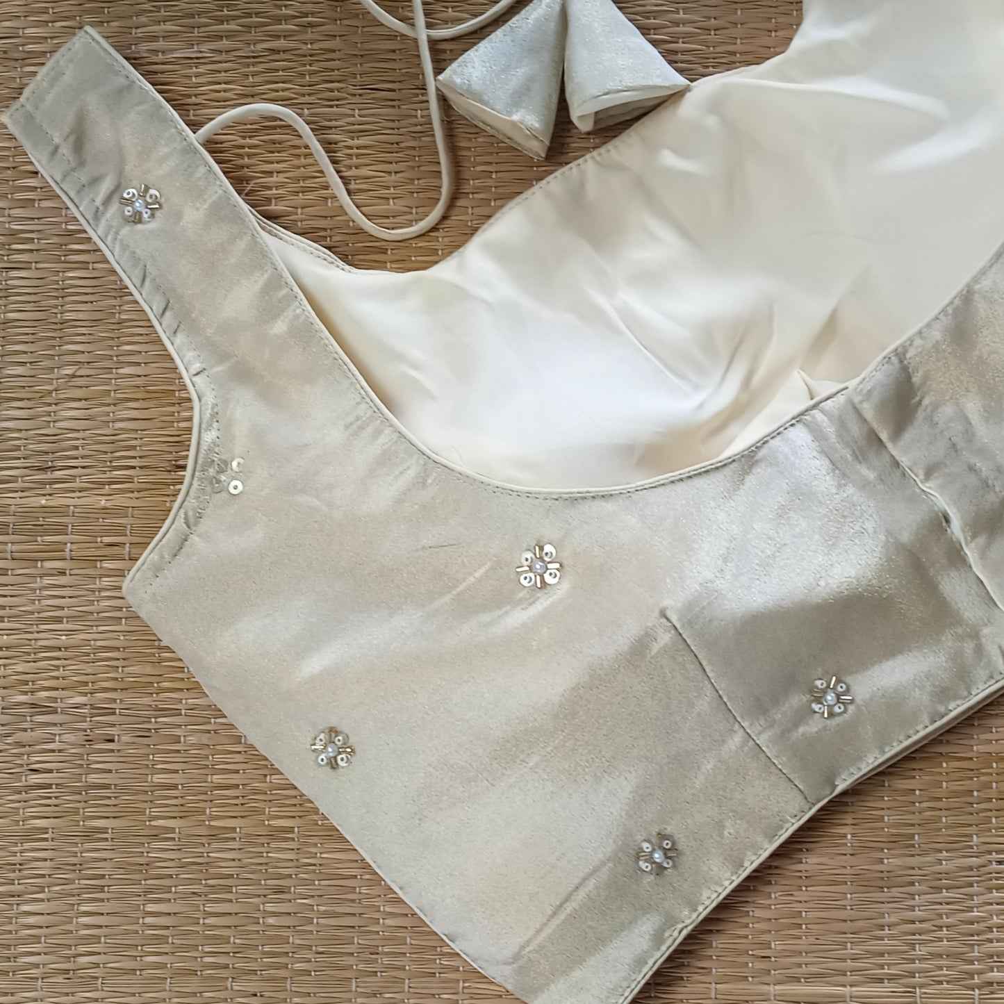 Light Golden Tissue blouse with pearl and cut dhana work( assorted )