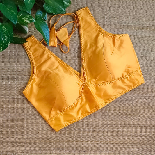 Yellow plain V-neck sleeveless blouse