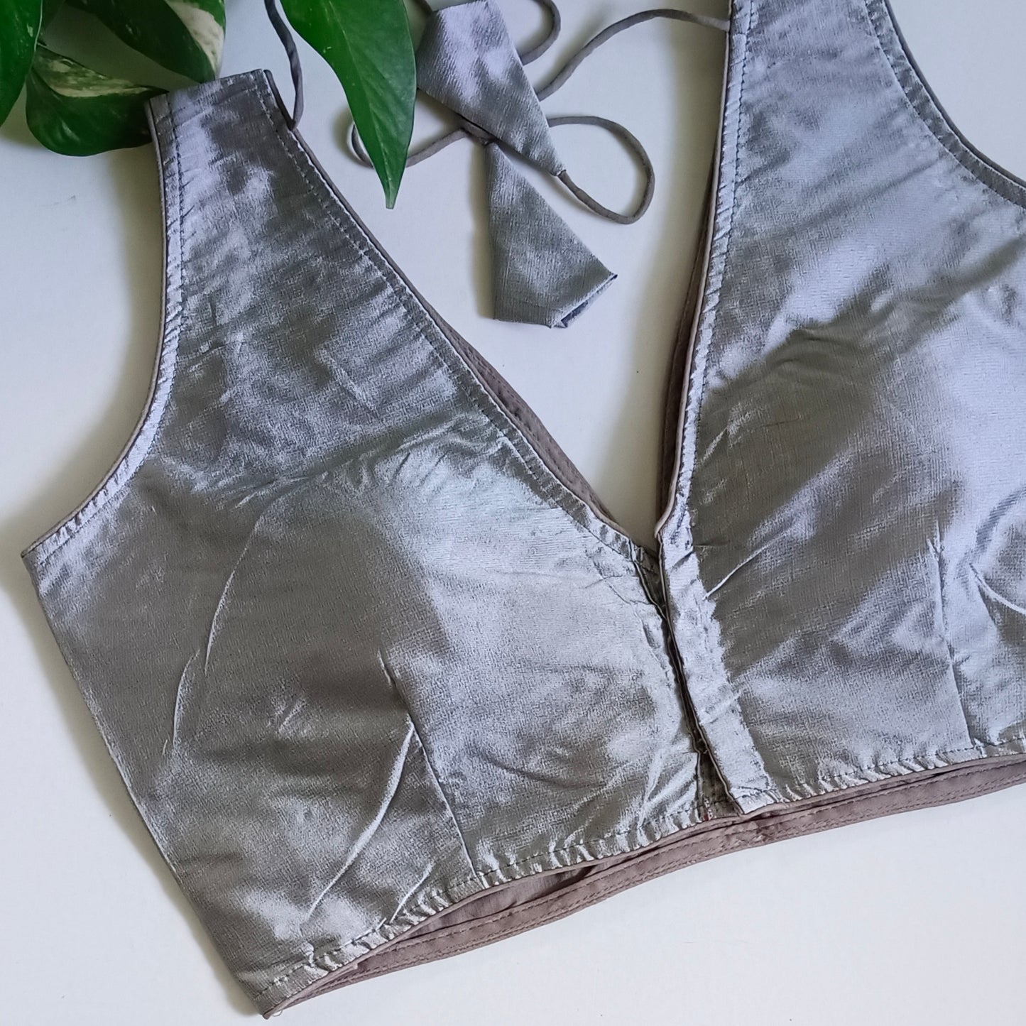 Grey plain V-neck sleeveless blouse